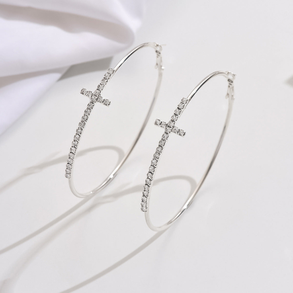 Exaggerated Rhinestone Cross Hoops