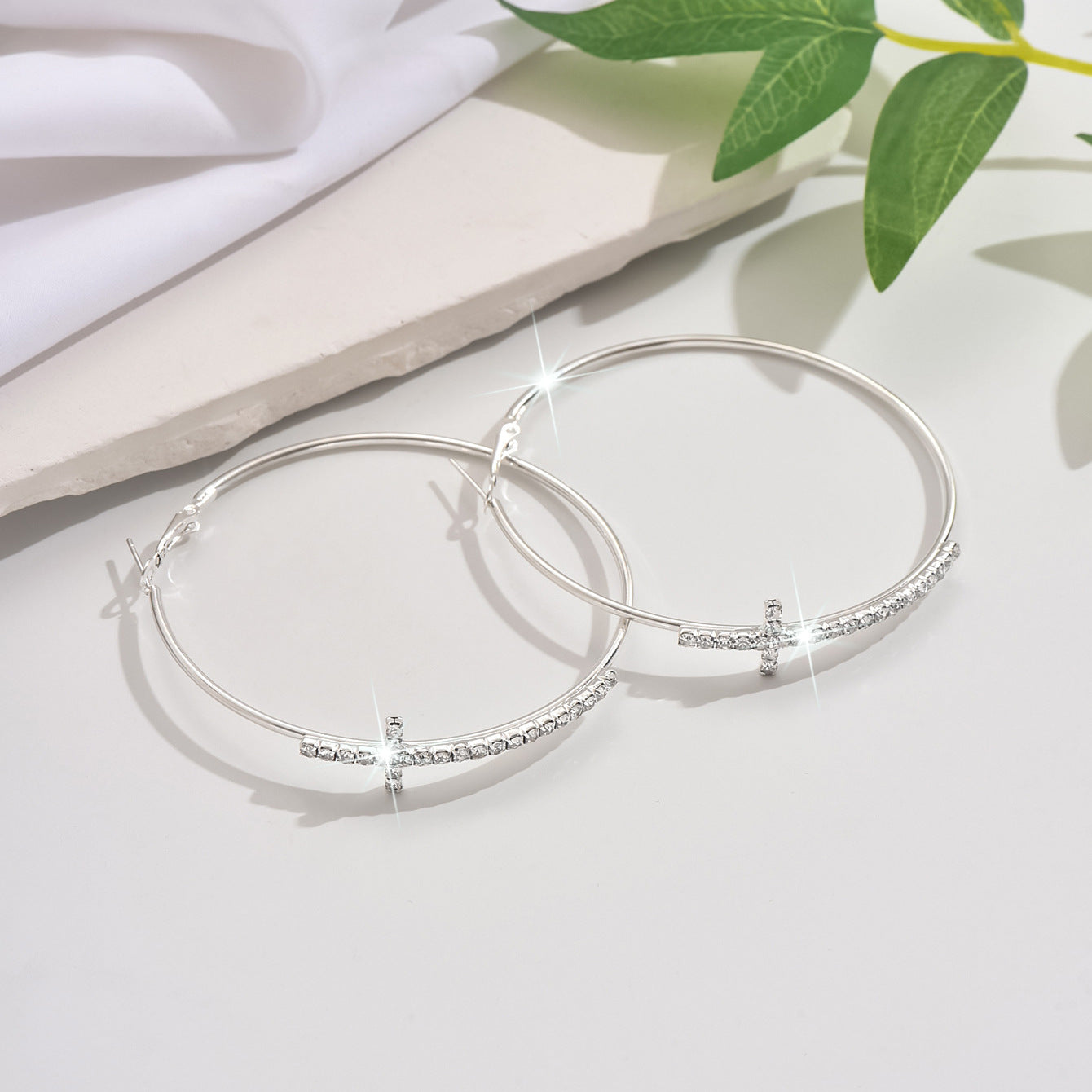 Exaggerated Rhinestone Cross Hoops